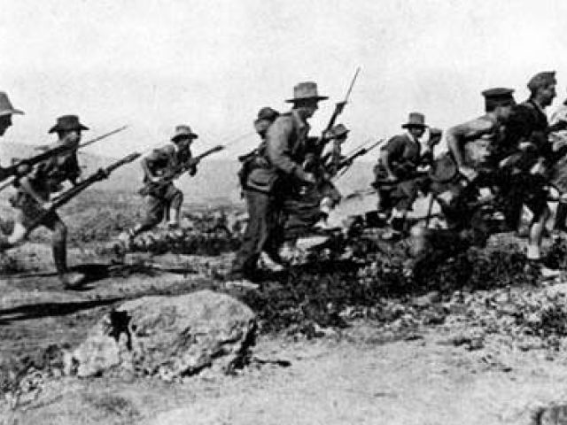 Troops charging to the front during World War I. File photo.
