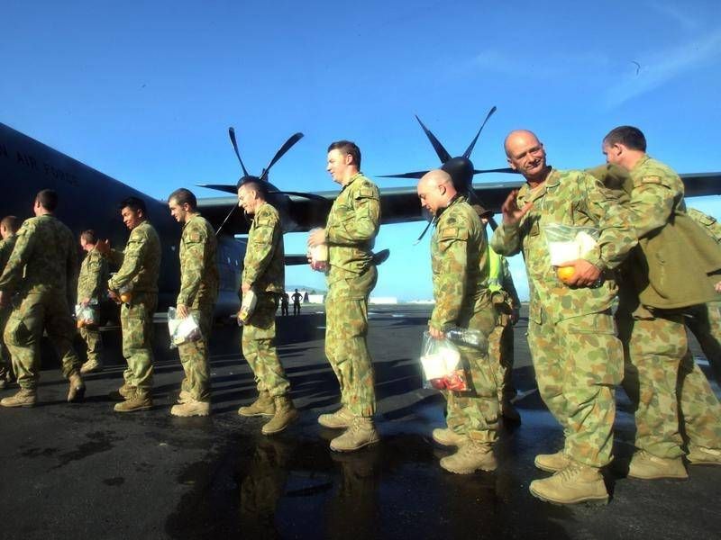 Australian peacekeepers, like those to East Timor, will be remembered at a ceremony in Canberra. (EPA PHOTO)