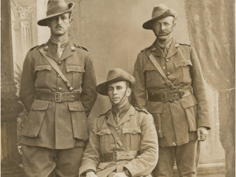 Studio portrait of three officer of the 23rd Battalion who all embarked together from Melbourne on 10 May 1915 aboard HMAT Euripides