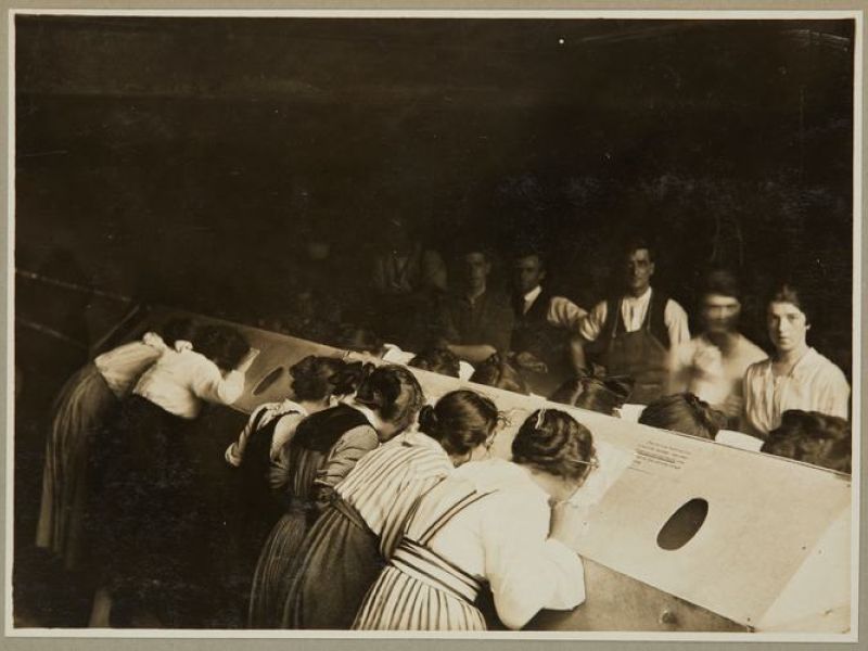 Male and female staff using an 'inhalatorium' at the Kodak Australasia Pty Ltd factory in Abbotsford.