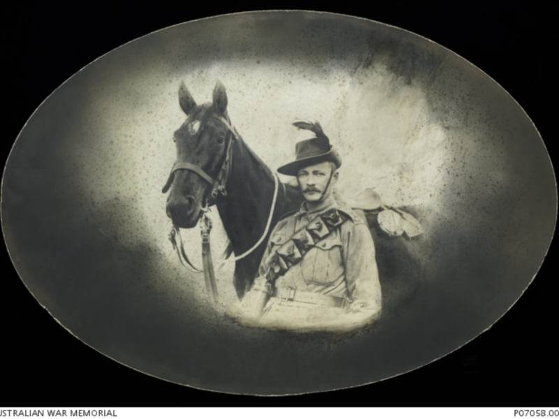 Informal portrait of Lieutenant (Lt) Frank Raymond Massie, 12th Light Horse Regiment, with his horse