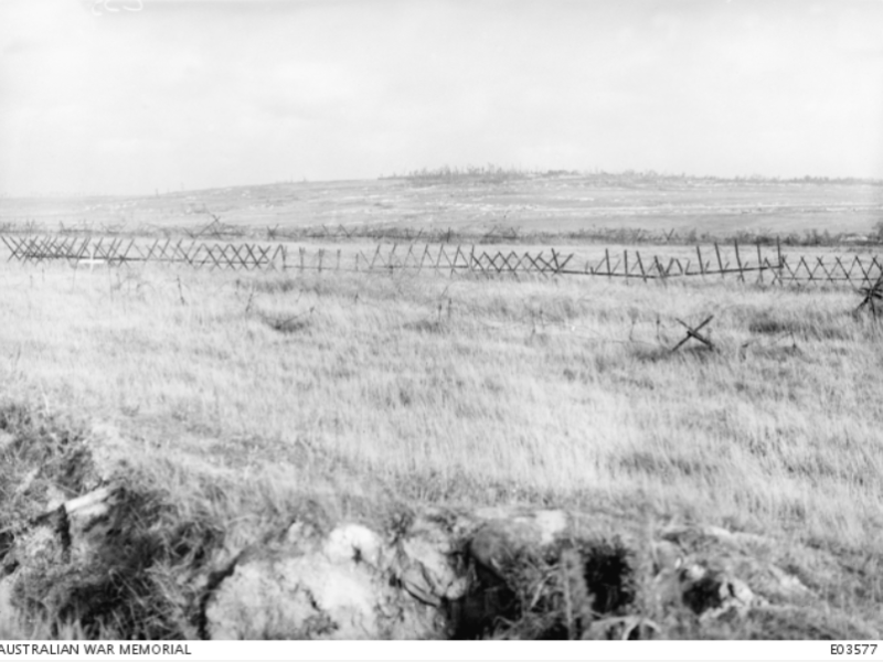 A view of Mont St Quentin taken from a hill near Cleary. Mont St Quentin was taken by troops of the 2nd Division on 1 September 1918. This great natural fortress reinforced by every device which German engineers could conceive was thought impregnable by its defenders, and its capture by the Australians, who were met everywhere by almost insurmountable obstacles, ranks as one of the most brilliant achievements of the war.