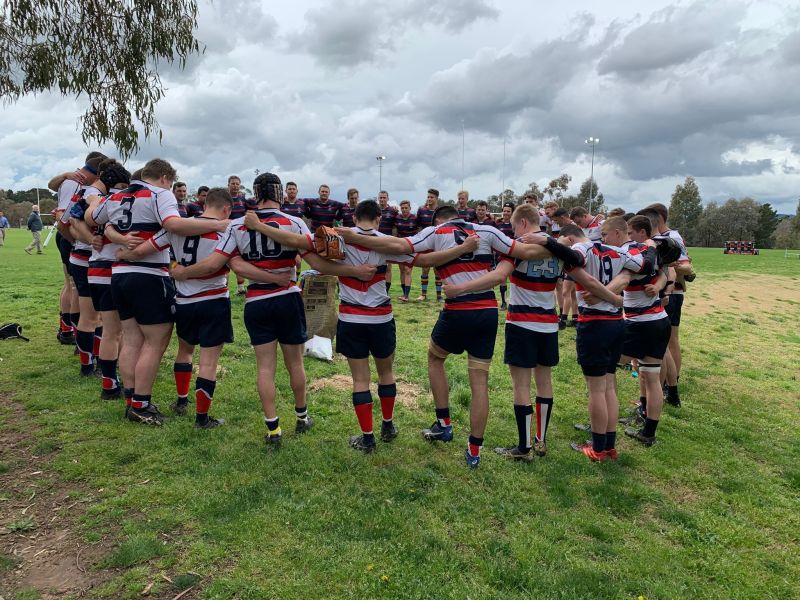 players at the end of training acknowleding the anniversary of the death of former Club Captain, John McNutt