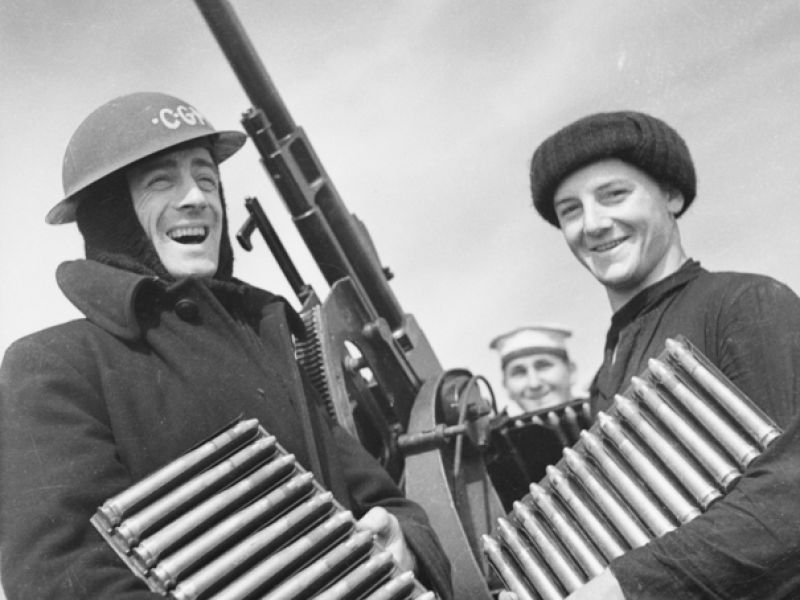 THREE CREW MEMBERS OF HMAS PERTH WITH AN ITALIAN BREDA MODEL 35 20 MM CANNON. LEFT TO RIGHT: CHIEF PETTY OFFICER (CPO) DONALD MATHIESON VINEY, "GUTS" HASTINGS AND BOB COOPER.
