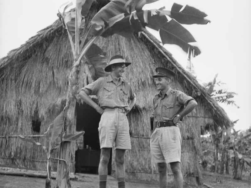 CAPTAIN B. HOOPER, AUSTRALIAN ARMY MEDICAL CORPS (LEFT), OFFICER COMMANDING A COMPANY, AND QX53208 LIEUTENANT F. A. N. STENLAKE, AUSTRALIAN ARMY MEDICAL CORPS,
