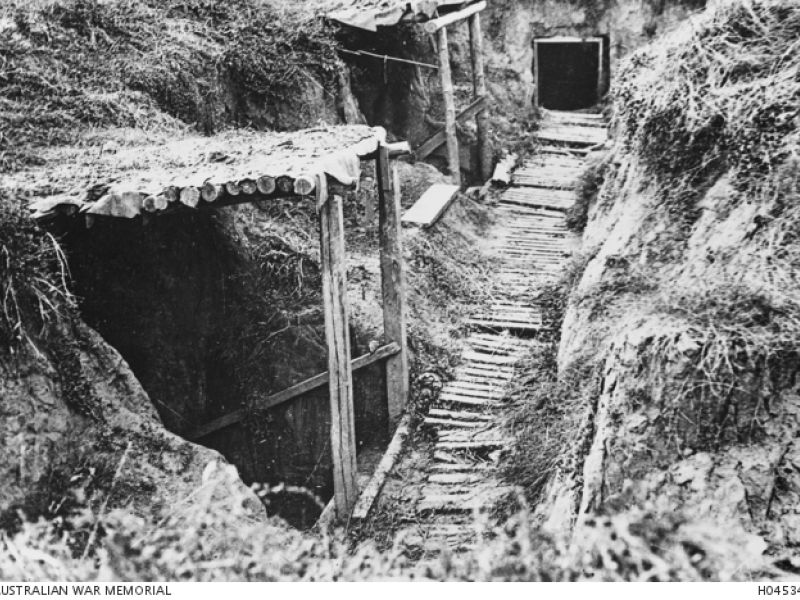 Hindenburg Line Area, France. 1918-09-13. A trench with duckboards and offshoot shelters