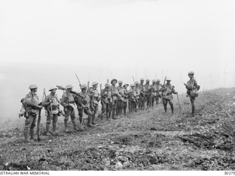 Warfusee-Abancourt, France. Lieutenant Rupert Frederick Arding Downes MC addressing his Platoon from B Company, 29th Battalion