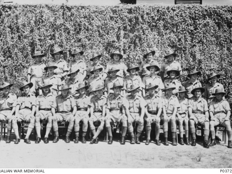 Group portrait of members of the 2/19th Battalion. The Battalion was captured by the Japanese in the fall of Singapore on 15 February 1942 and most of the men were killed in action (KIA) or held as prisoners of war (POW). 