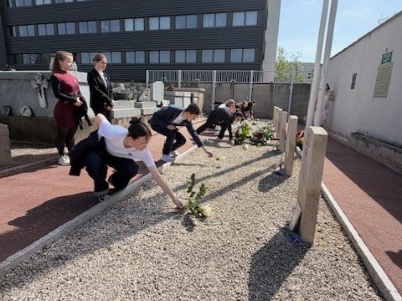 Students laying wreath at Lafourguette cemetery, Toulouse France