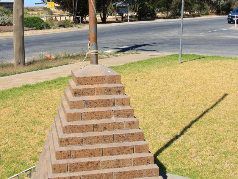 Patchewollock "Lest We Forget" Memorial Cairn with Painted Silo in the Background