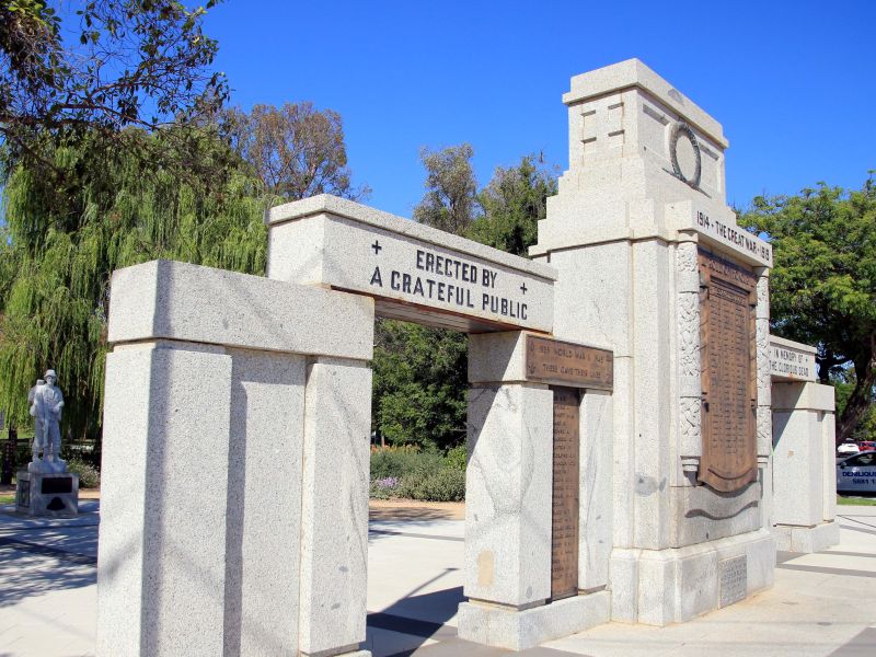 Deniliquin War Memorial with Vietnam War Memorial Soldier and Dedication Plaques in the Background