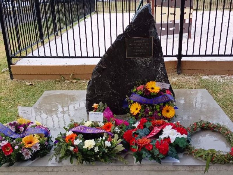 Memorial shown with Anzac Day wreaths on 25 April 2023