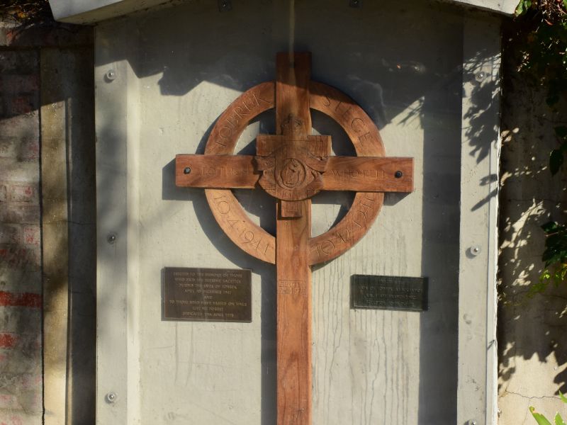 The Commemorative Cross, set behind a transparent cover