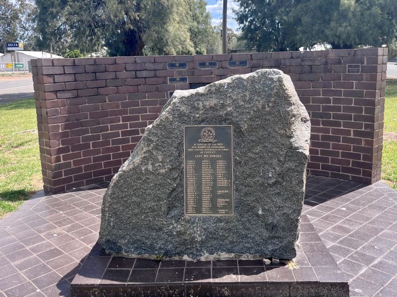 Plaque on stone remembers all locals who served