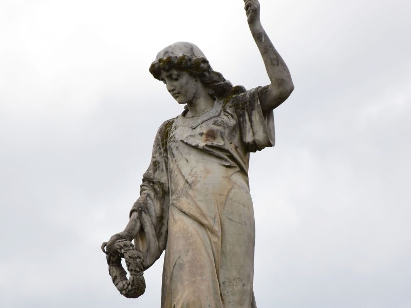  The figure of "Remembrance" holding a wreath