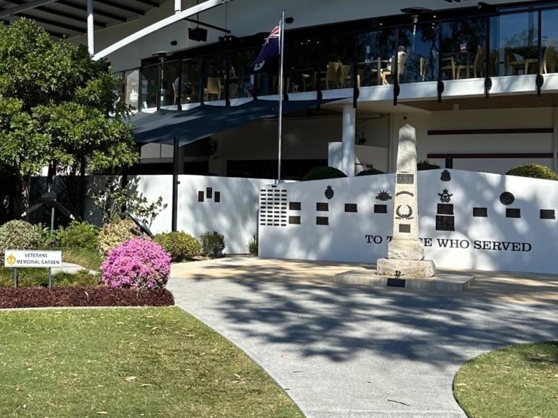 Wide shot of obelisk and wall in front of the RSL