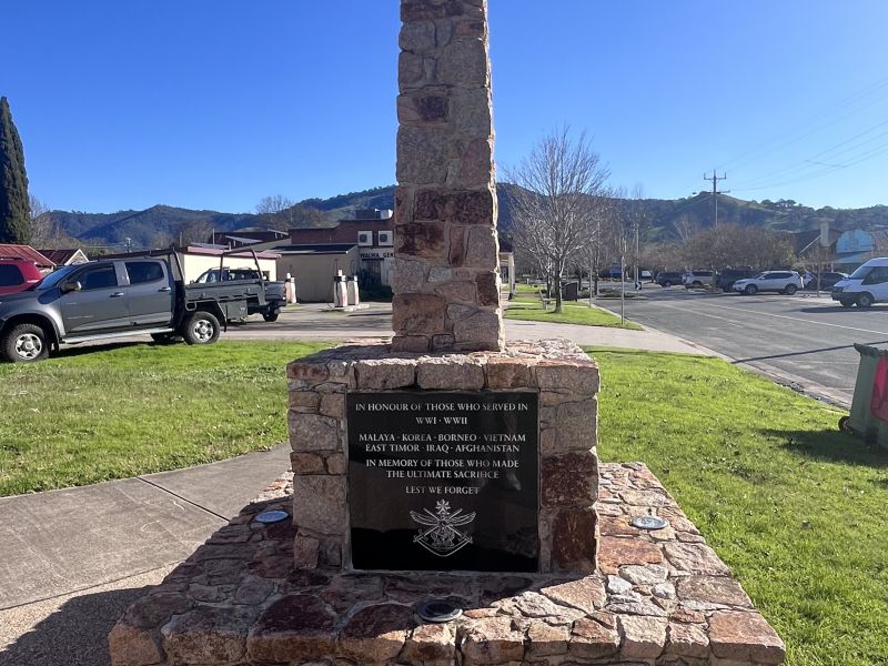 The monument stands in front of the Services Memorial Hall
