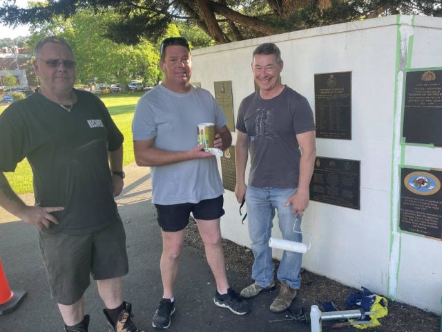 FROM DIGGERS TO PAINTERS: Mark Anderson, James Worley and David McIntee at the Memorial Wall. Picture: Joshua Peach
