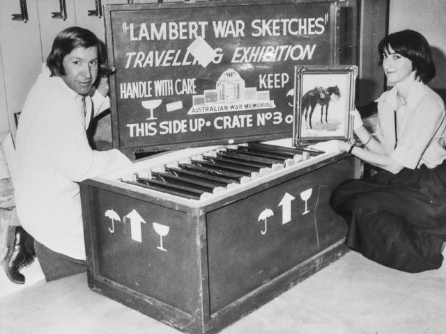 Antoon Boss, head of AWM Conservations and Judith McKay, Curator of art pack George Lambert's sketch 'Australian troop horse full marching order' into a crate for exhibition in Newcastle in 1979