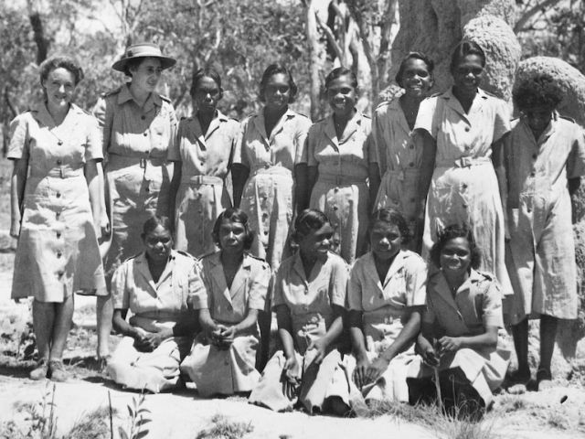 Most of the women pictured here with Corporal Dolly (front row second from left) are yet to be formally identified. Image no: 069186