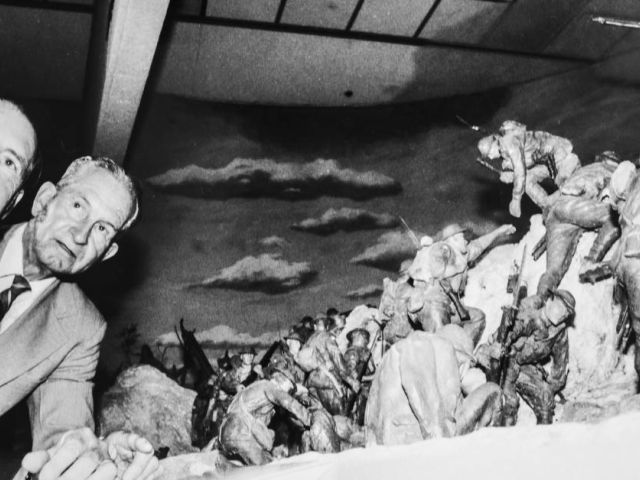 The War Memorial is presented its 51st Victoria Cross. Nephew of the recipient Alexander Henry Buckley, (left) Neville Buckley of Eagle Heights, QLD and Cedric Buckley of Bundaberg check out the diorama of the battle in February 1991