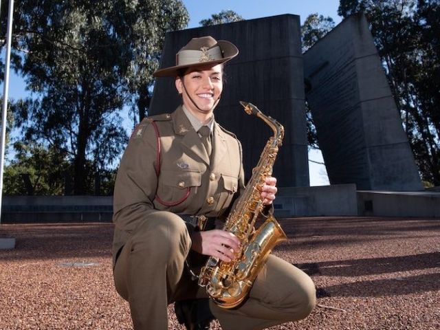Army musician and sax player Jaime Grech… “Jaime’s got a lot of youthful energy and if she is the future of military music, we’re in good shape,” says Chris Latham. Photo: Holly Treadaway