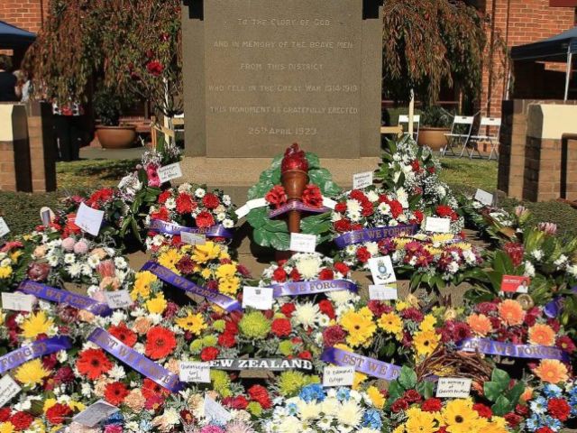 Floral wreaths at Queanbeyan Cenotaph on Anzac Day 2021. Photo: Trisha’s Sports Photos.