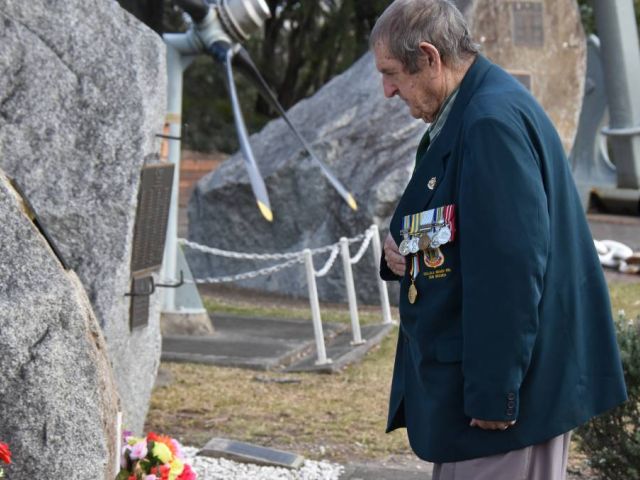 Veterans remember Korean War. Photo by South Coast Register