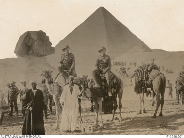 Brothers Oliver and Joe Cumberland on camels near the Sphinx and Pyramids