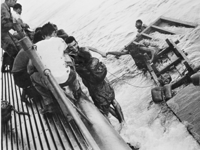 Image of oil soaked British and Australian POW survivors of the Japanese transport Rakuyo Maru rescued three days later by the USS Sealion, 1944