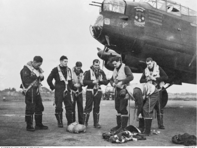 Crew of M for Mother, a Lancaster aircraft with No. 467 Squadron RAAF in Bomber Command, preparing to take off on a raid over Berlin on 14 September 1943. 