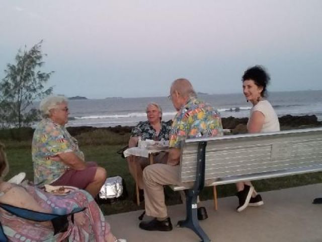 Denis Ratcliffe, Michael, Frank, Pauline and Noelene Holman on one of the memorial seats commissioned by Emu Park Lions
