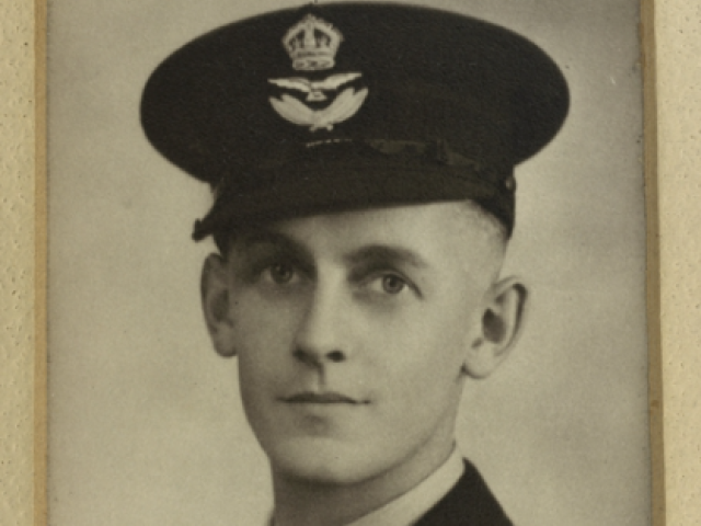Studio portrait of 407219 Flying Officer Philip Gardner Brooks from Wattle Park, South Australia, c. 1940
