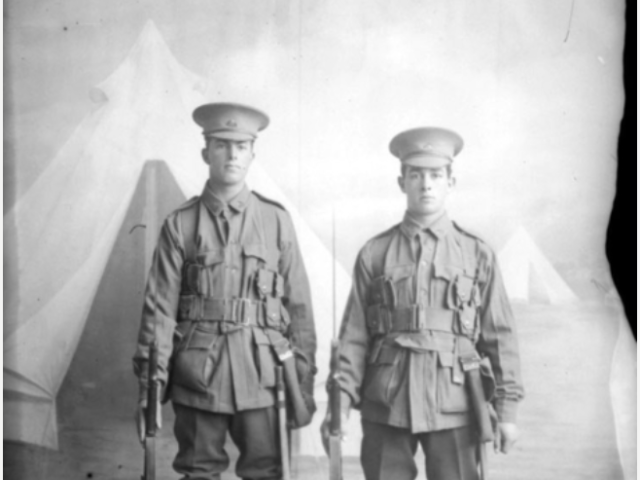 Studio portrait of 70 Private (Pte) Charles Fowler Murrell, 22nd Battalion, of Essendon, Vic, (left) and Pte J Williamson, 11 May 1915