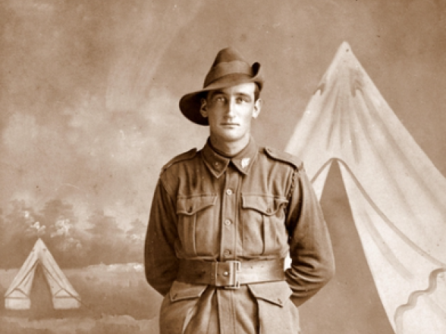 Studio portrait of 5679 Private (Pte) Sydney Cooper, 48th Battalion. c.1916