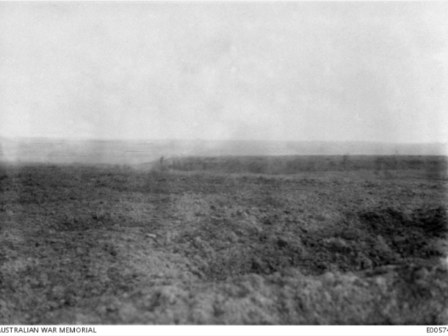 A view of no man's land from our front line parapet, near Gueudecourt, in January 1917. The sunken road can be seen in the background.