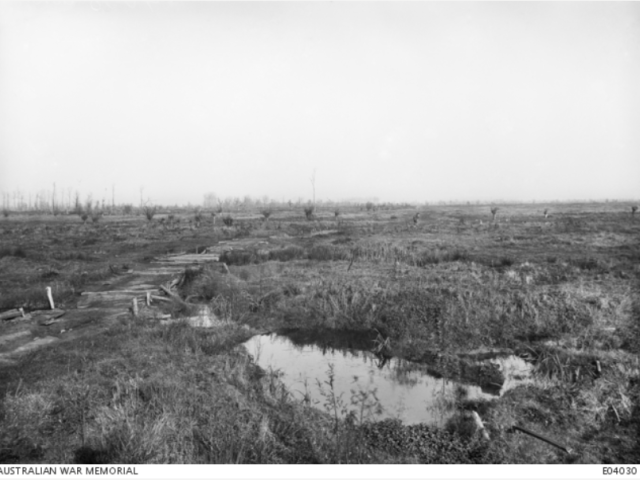 The old no man's land of Fromelles battlefield viewed from the north-east corner of Sugar Loaf Salient looking towards the line from which the 15th Australian Infantry Brigade began their attack on 19 July 1916.