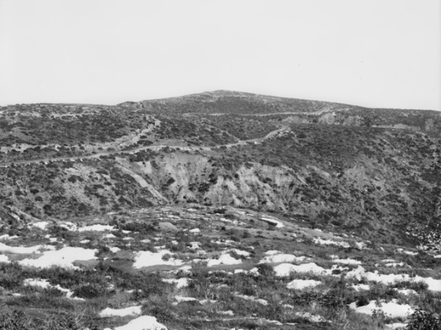 The summit of Hill 971 from Chunuk Bair looking north. Photograph taken on the Gallipoli Peninsula under the direction of Captain C. E. W. Bean of the Australian Historical Mission, 1919.