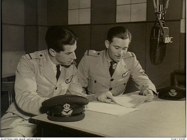 London, England. 1944-01-07. Pilot Officer Colin Levings (left) of Kalgoorlie, WA and Flying Officer Ken Gardiner of Highgate Hill, Qld, both of the RAAF