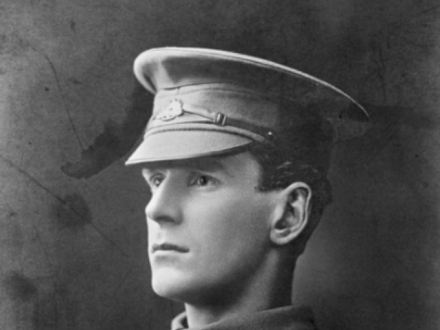 Studio portrait of 14609 Private (Pte) Oscar Leonard Godlee, 9th Field Ambulance, Australian Army Medical Corps (AAMC), AIF. 1916