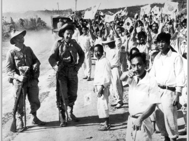 Ernie Stone (L) and Rex Wilson (R) cheered on by South Korean natives