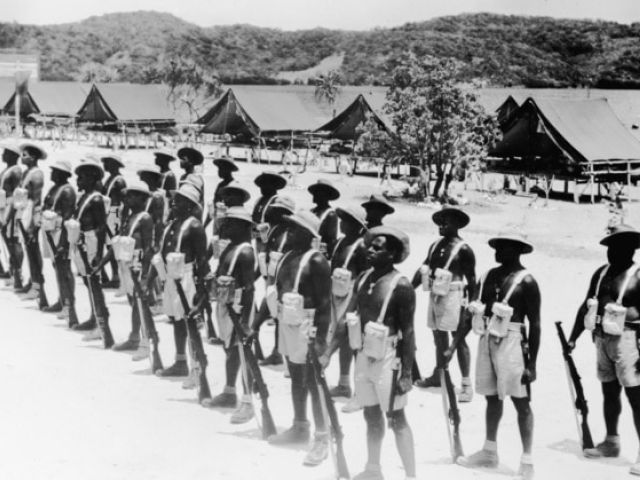 Members of the Torres Strait Light Infantry Battalion on parade during World War II.(Supplied: Australian War Memorial [119169])