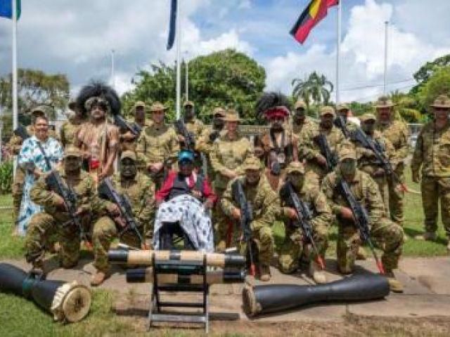 Chief of Army Lieutenant General Simon Stuart with Regimental Sergeant Major – Army Warrant Officer Kim Felmingham, WW2 veteran Mr Awati Mau and members of Sarpeye Company, 51FNQR