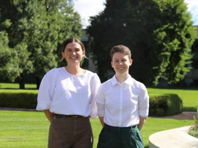 Summer scholars Anna Wilkinson and Hannah Billington in the grounds of the Australian War Memorial. Photo: Australian War Memorial