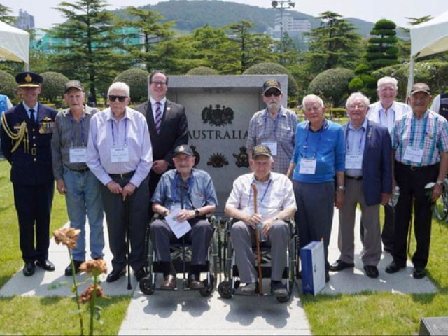 Australian veterans of the 1950-53 Korean War and Australian Minister of Veterans' Affairs and Defense Personnel Matt Keogh, fourth from left, mark the 70th anniversary of the end of the war last Thursday by paying tribute to the veterans interred at the UN Memorial Cemetery in Korea in Busan. [EMBASSY OF AUSTRALIA IN KOREA]