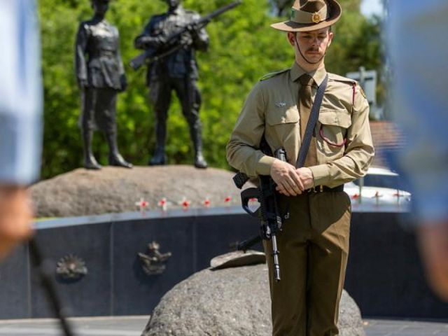 A soldier rests on arms during a service marking the 10th anniversary of the dedication of the Aboriginal and Torres Strait Islander War Memorial in Adelaide. (Image: Sergeant Nicci Freeman)