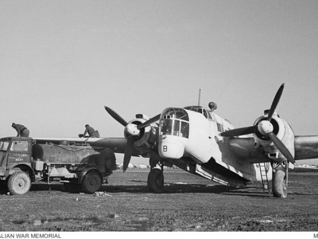 Foggia, Italy. c. January 1944. Maintenance personnel refuelling a Vickers Wellington aircraft of No. 458 Squadron RAAF.