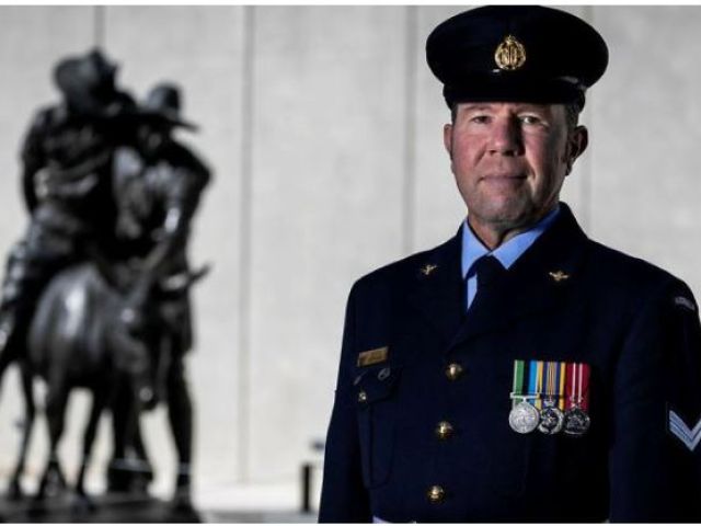Air Force's Corporal Kevin Jeffries, of Australia's Federation Guard, reflects at the statue of Simpson and his Donkey at the Australian War Memorial before heading to Lone Pine for Anzac Day 2025. Photos: Sergeant Sagi Biderman