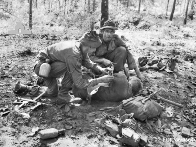 Vietnam. 19 August 1966. Lance Corporal Georgie Richardson, (left), D Company medic, and Sergeant 
