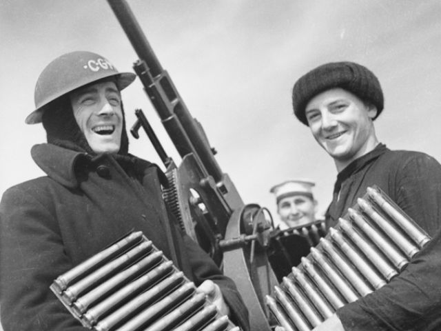 THREE CREW MEMBERS OF HMAS PERTH WITH AN ITALIAN BREDA MODEL 35 20 MM CANNON. LEFT TO RIGHT: CHIEF PETTY OFFICER (CPO) DONALD MATHIESON VINEY, "GUTS" HASTINGS AND BOB COOPER.